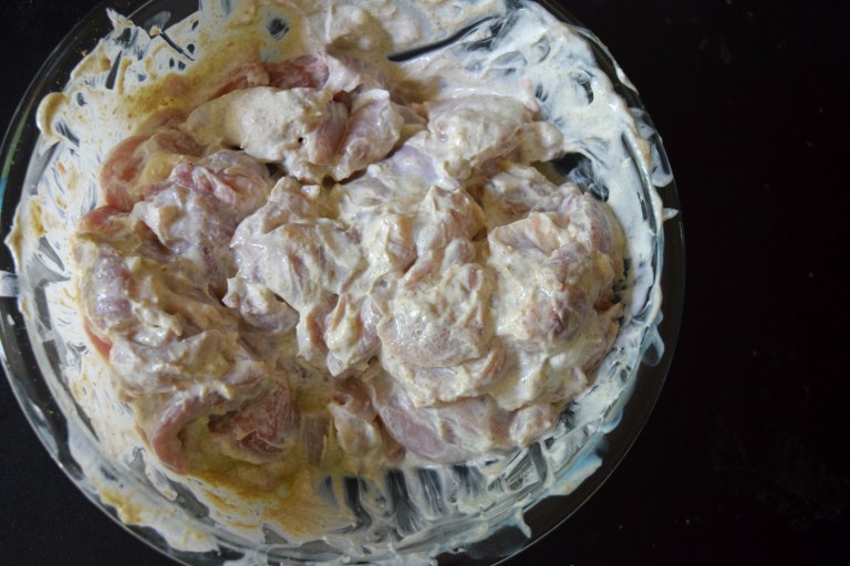 Raw Chicken soaking in yogurt